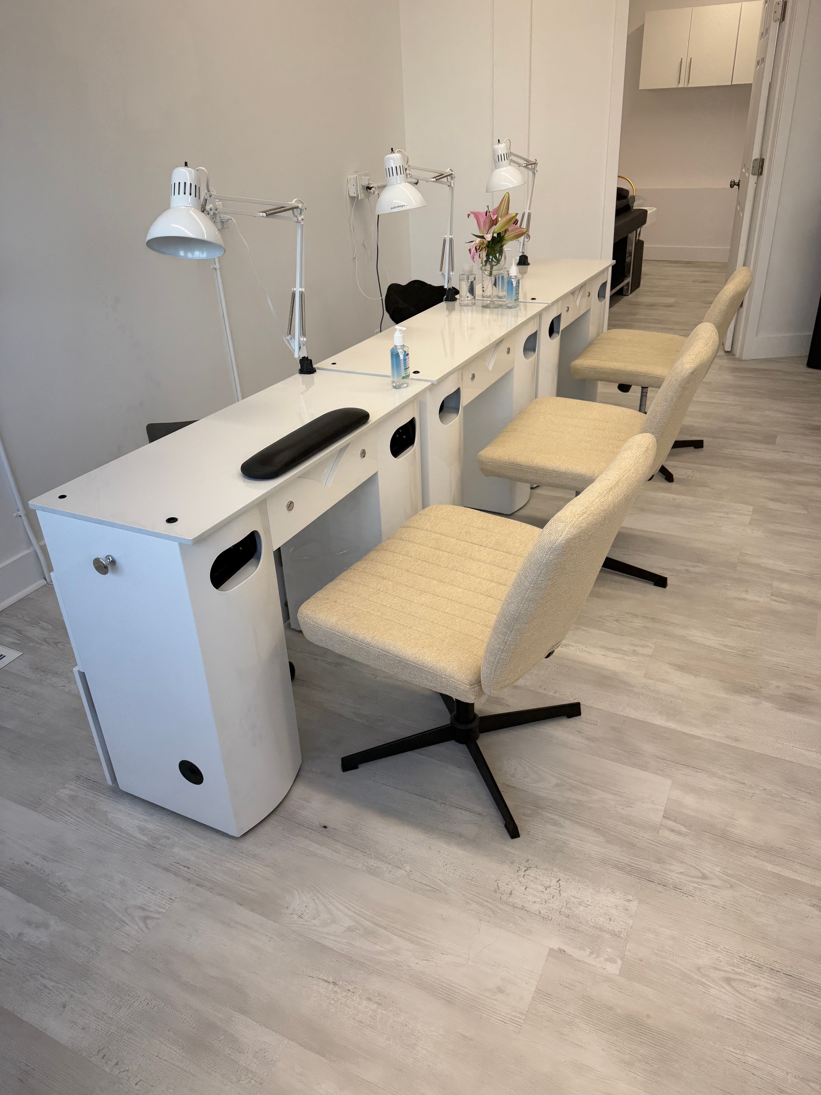 Nail salon interior with warm golden atmosphere